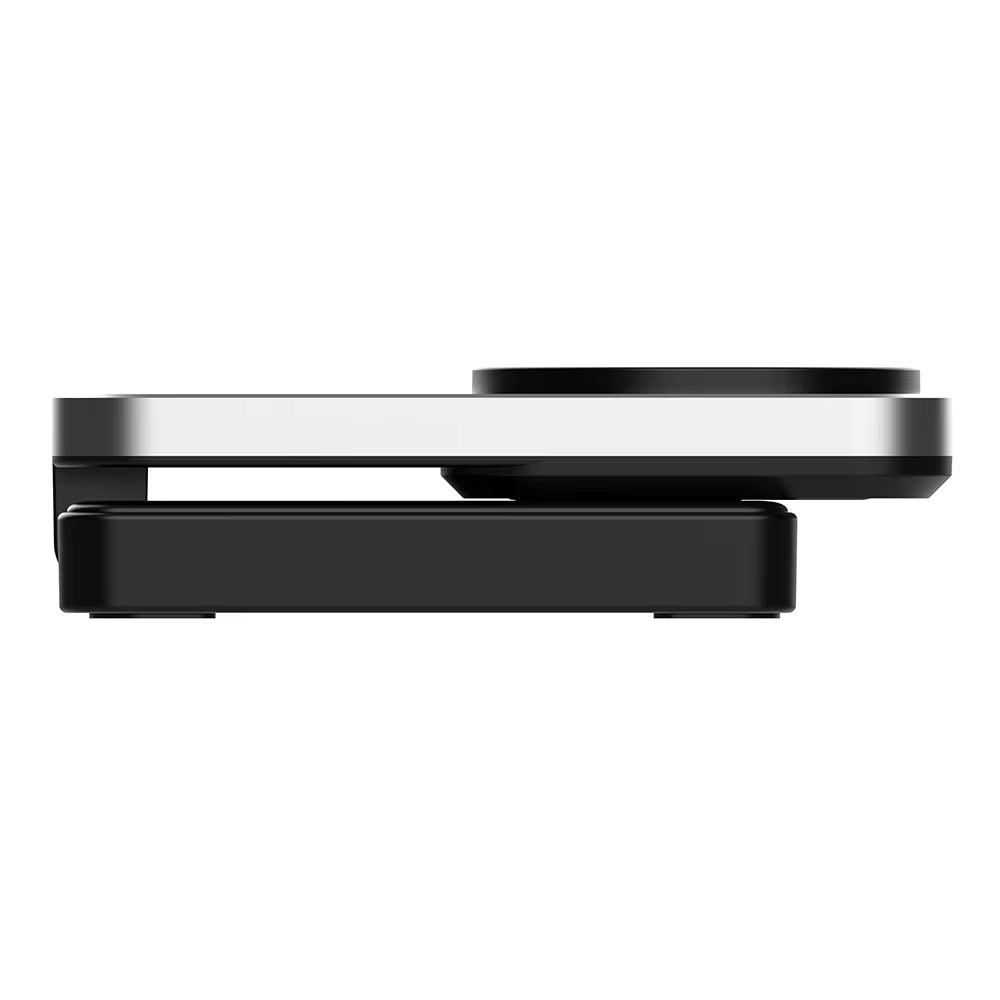 A close-up side view of a black 4-in-1 wireless charger with a silver metallic top edge, shown against a plain white background.
